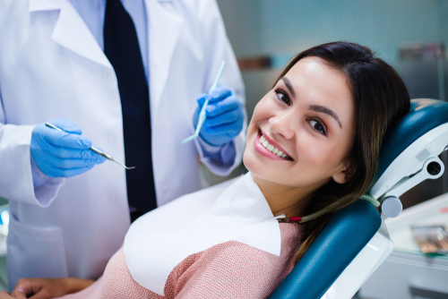 woman sitting in dental chair