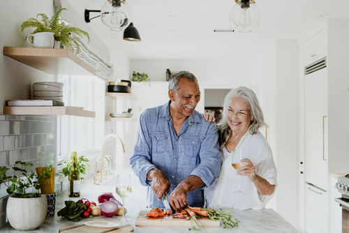 man and woman cooking 