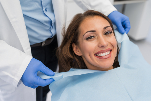 woman smiling after dental cleaning
